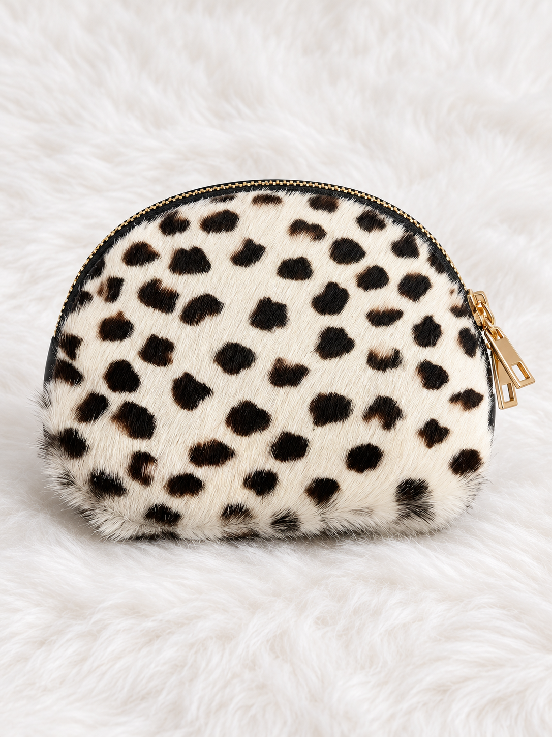 Monedero Snow Chic sobre pelito blanco